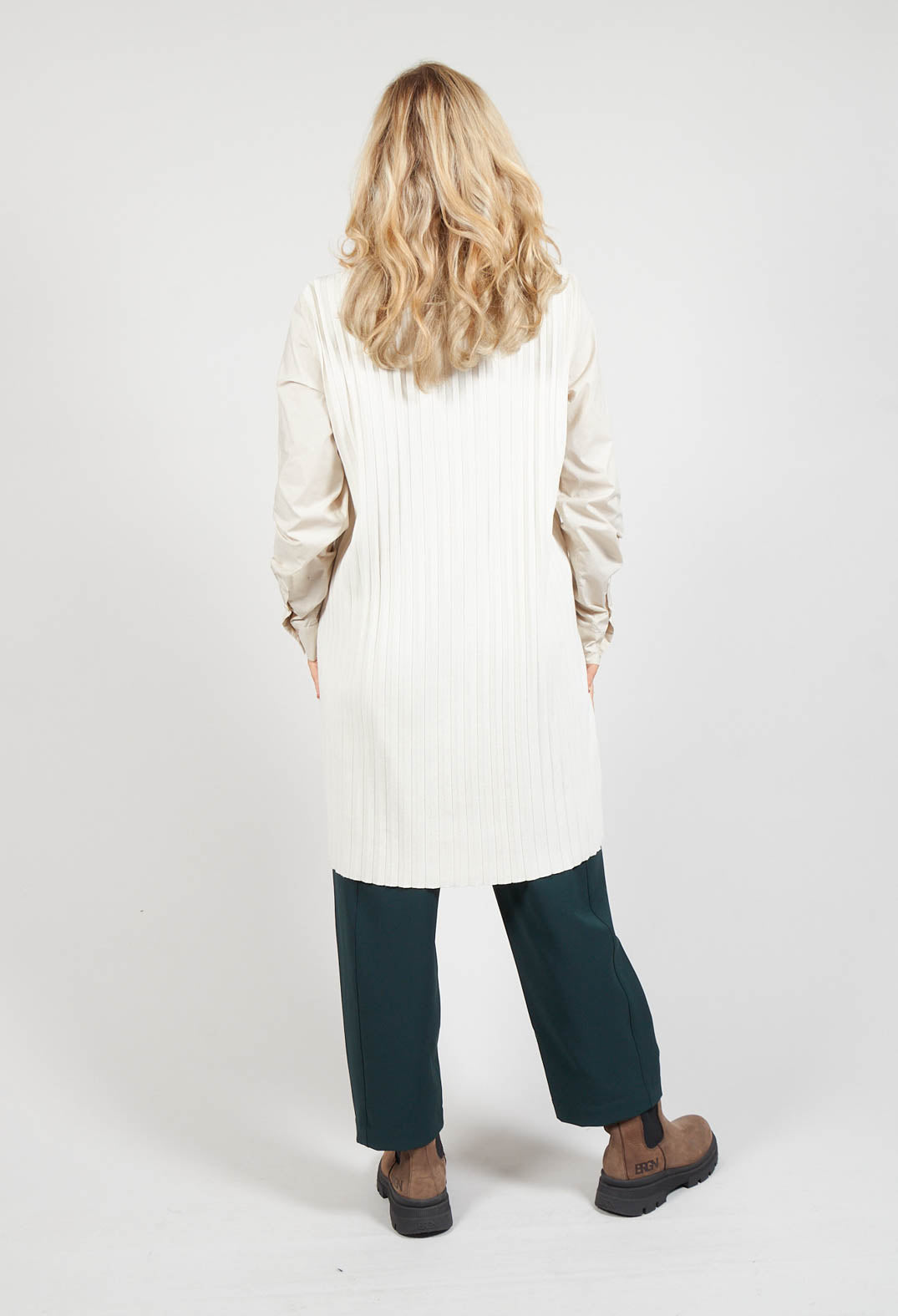 behind shot of ladies long sleeve blouse in cream