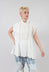 Kusfrau Top in Schnee