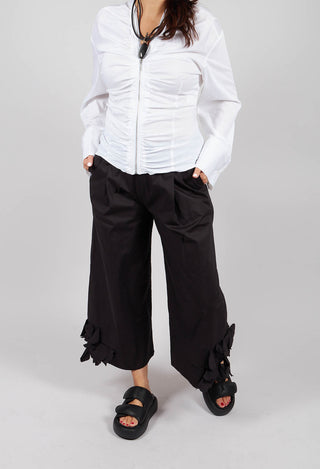 Frill Hemmed Trousers in Black