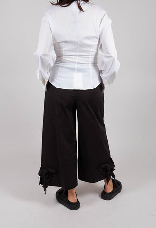 Frill Hemmed Trousers in Black