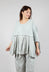 Top with Tulip Peplum Hem in Grey