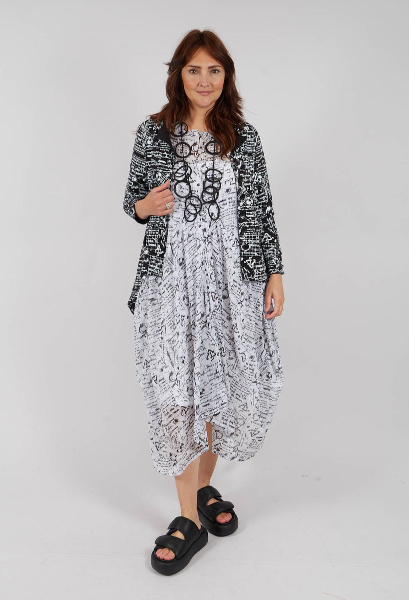 Handkerchief Hem Dress in White with Black Seregraphy – Olivia May
