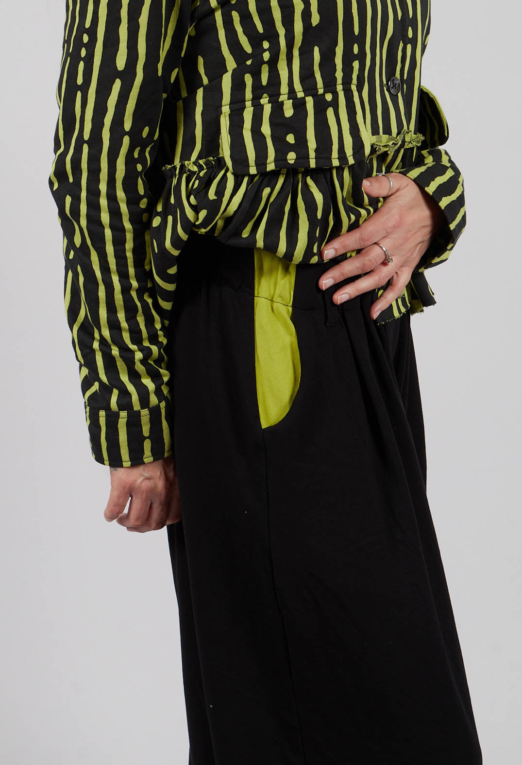 Relaxed Fit Trousers in Black with Lime Insert