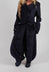 Wide Velvet Tulip Hem Trouser in Black