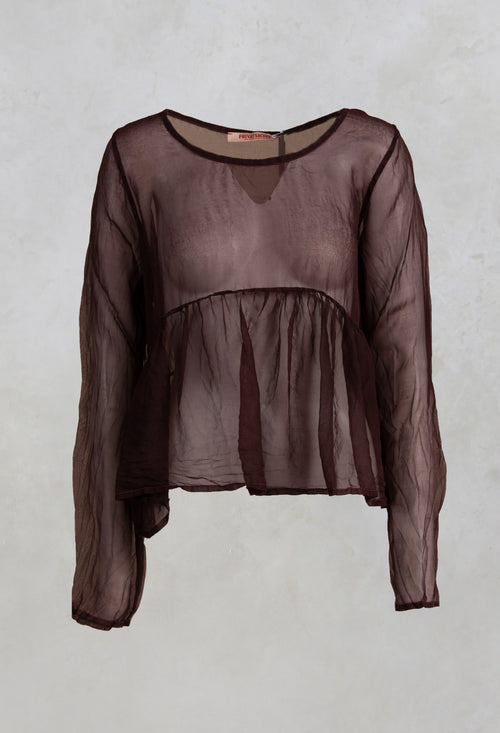 Sheer Peplum Top in Hildegard