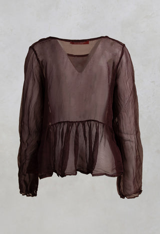 Sheer Peplum Top in Hildegard