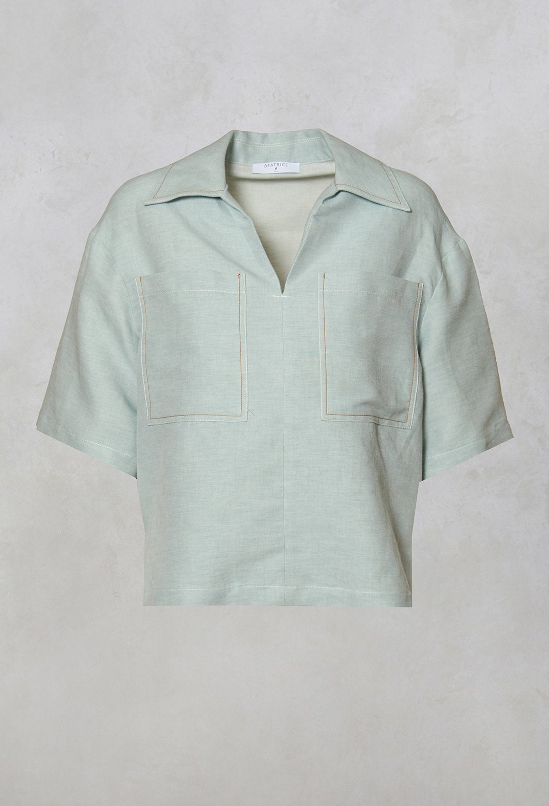 sky linen blouse with large pockets and neck collar