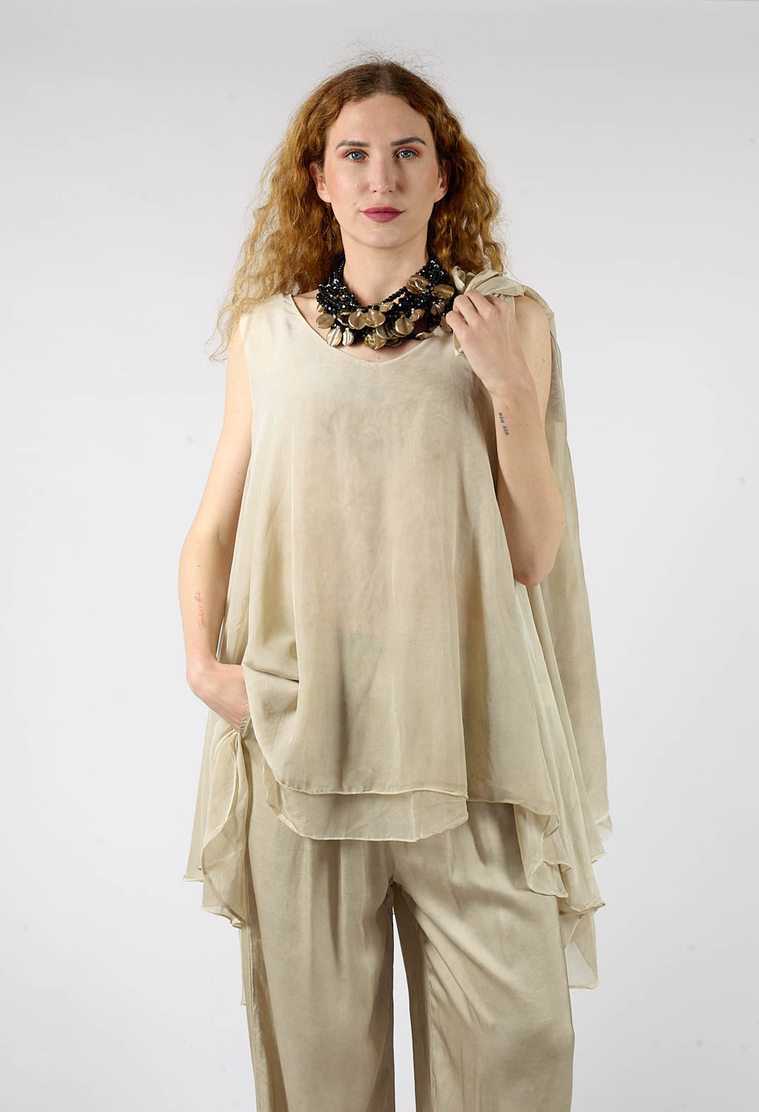 Asymmetrical Sheer Finish Top in Gold
