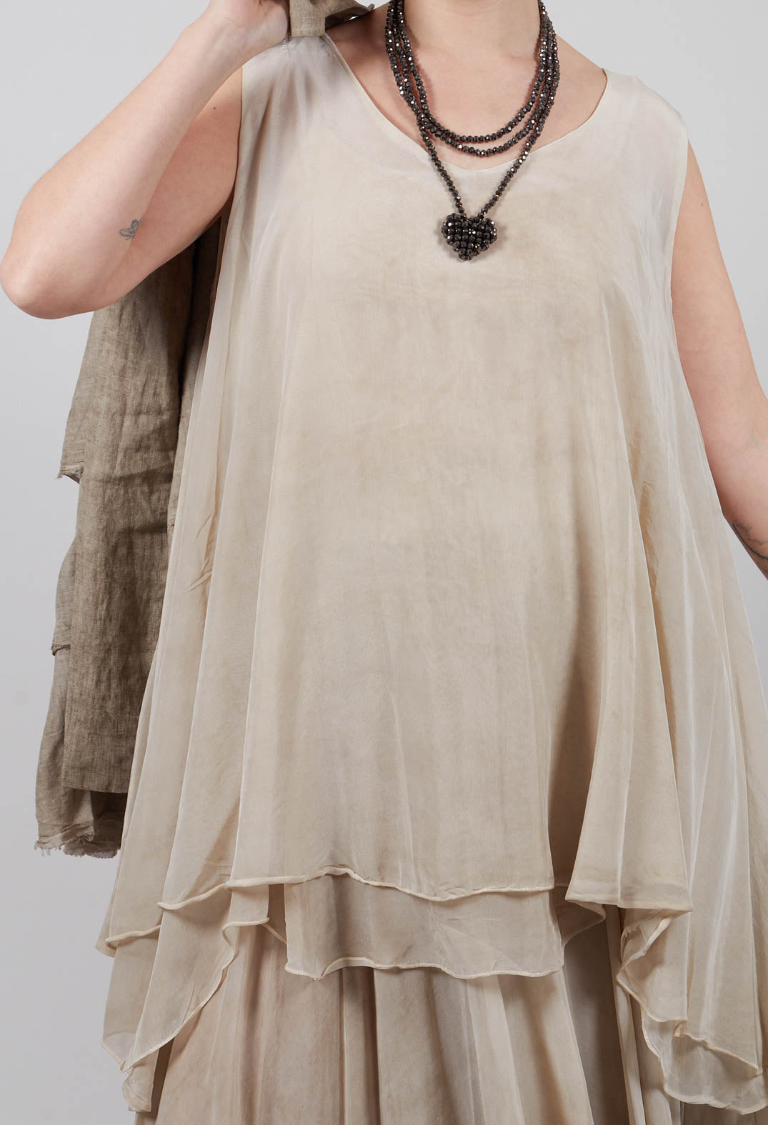 Asymmetrical Sheer Finish Top in Gold