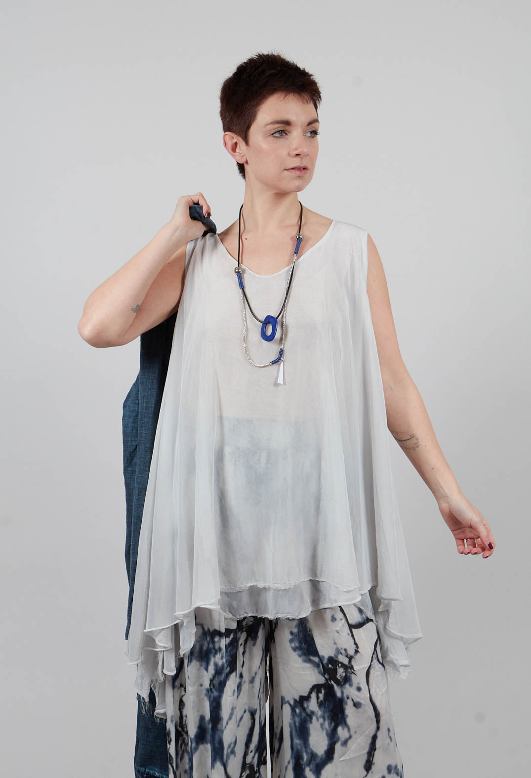 Asymmetrical Sheer Finish Top in Ice