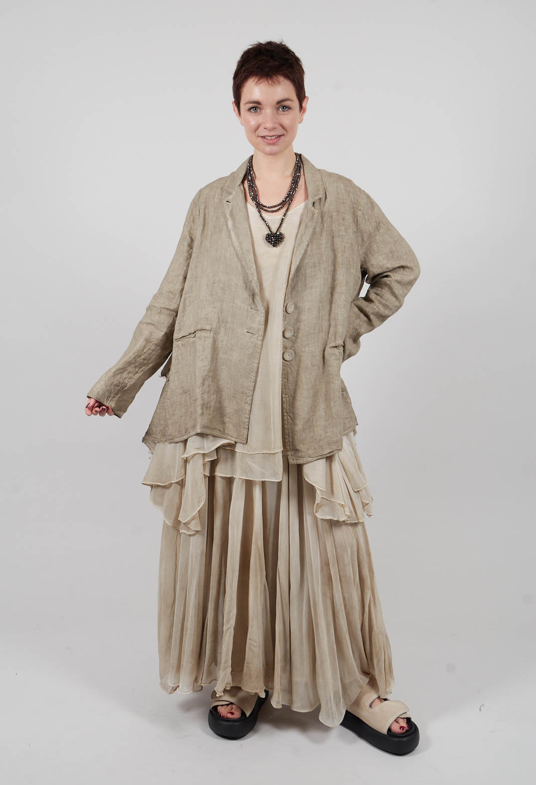 Asymmetrical Sheer Finish Top in Gold