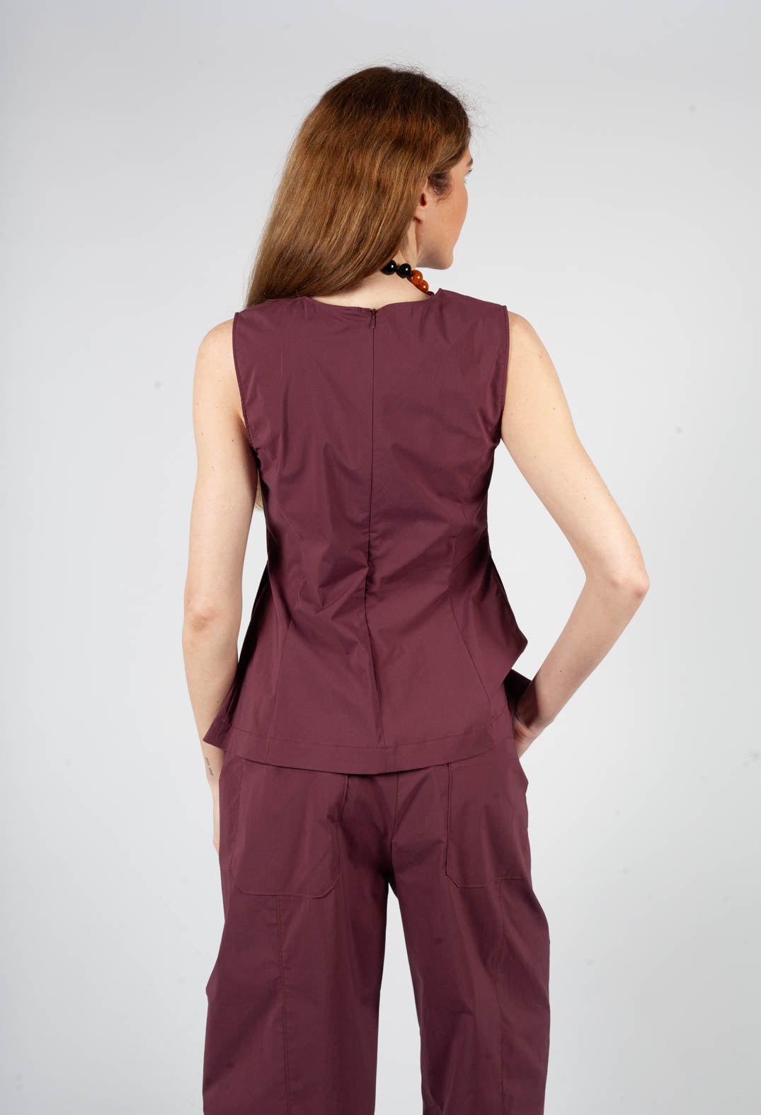 Peplum Pleat Top in Burgundy