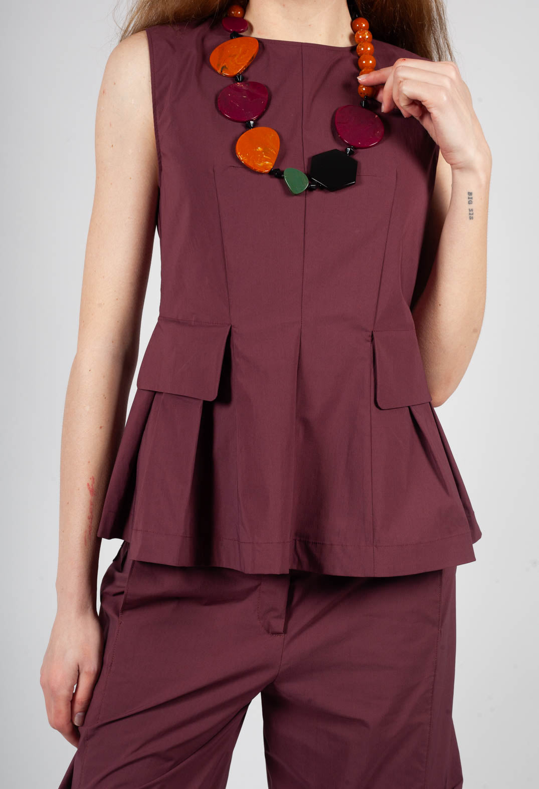 Peplum Pleat Top in Burgundy