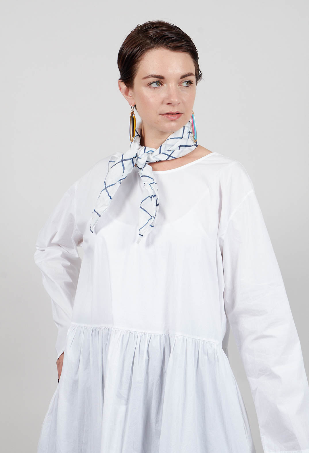 Koci Long Sleeve Smock Dress with Pockets in Bianco
