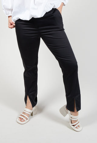 black tailored trousers with front pockets
