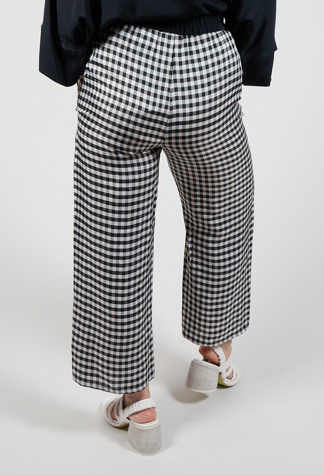 black checked trousers with front pockets
