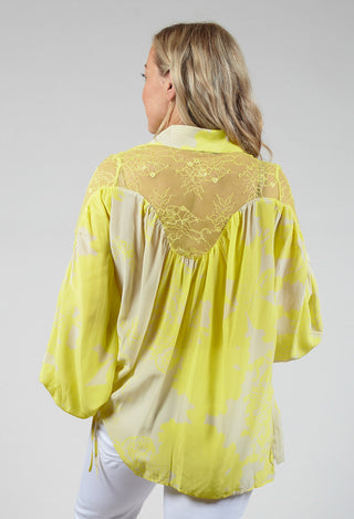 back detailing on Beatrice B cream lace blouse 