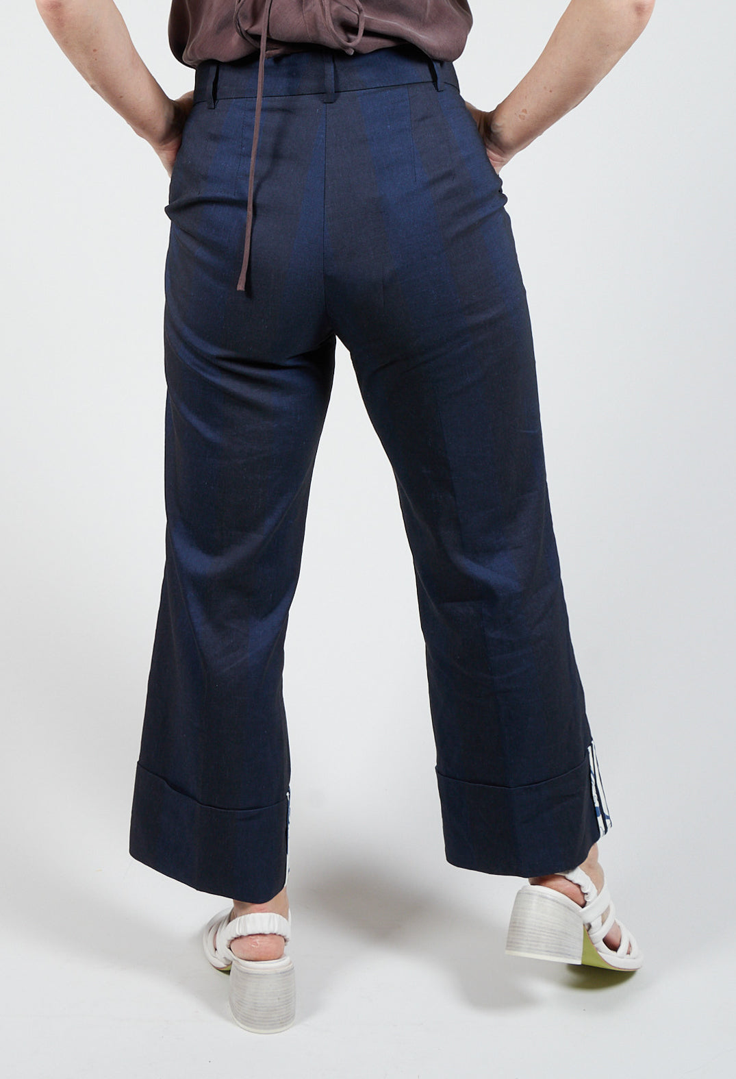 striped turn up blue trousers with front pockets