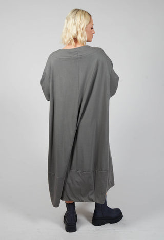behind shot of ladies jersey dress in grey with round neck detailing