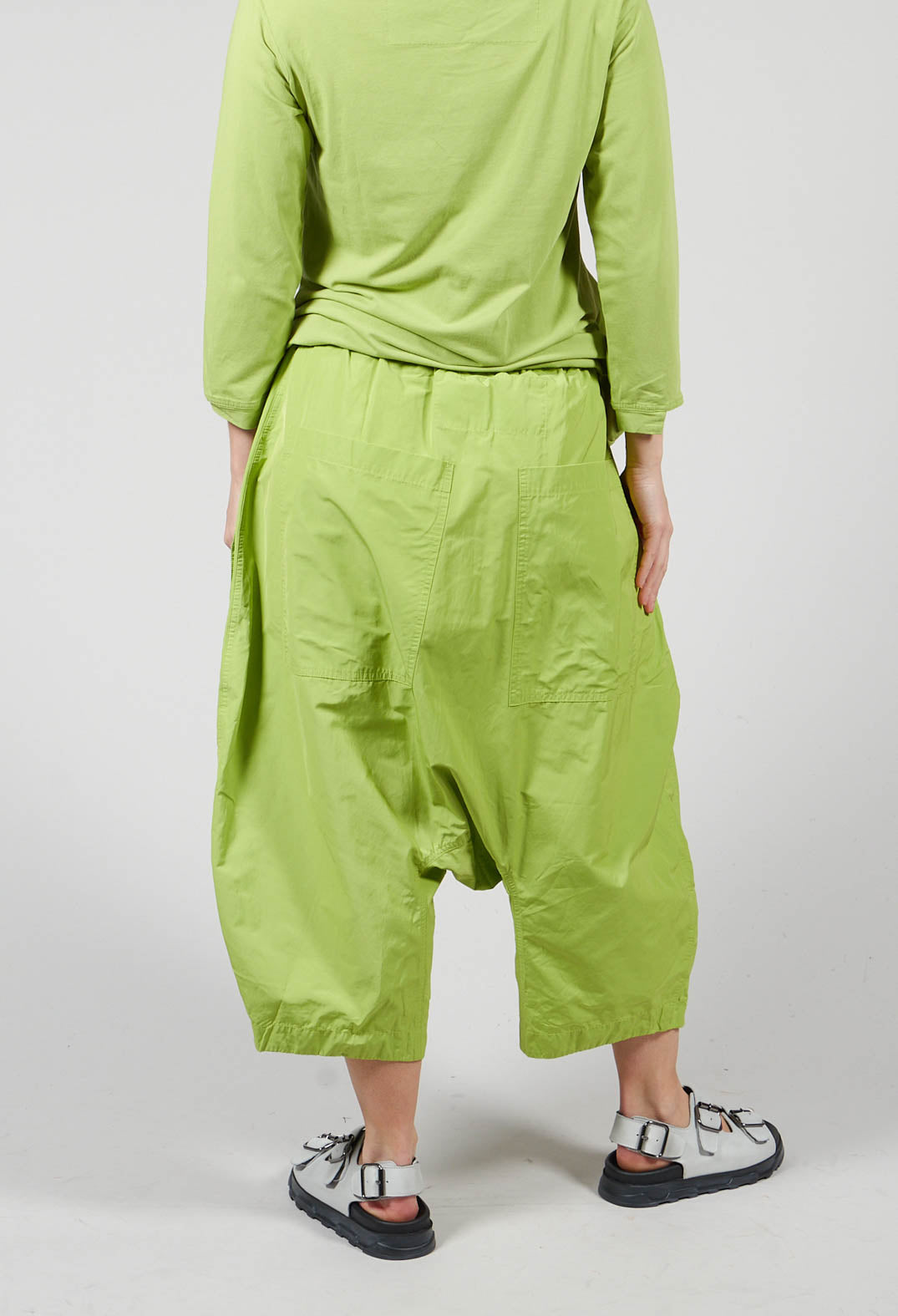 Cropped Drop Crotch Trousers with Curved Pocket Detail in Kiwi