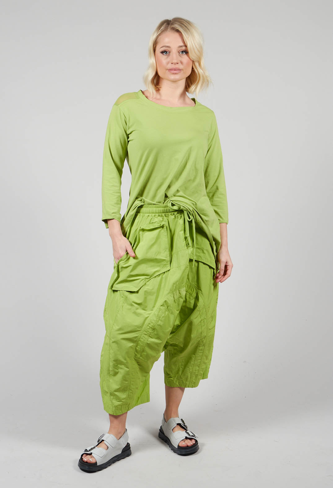 Cropped Drop Crotch Trousers with Curved Pocket Detail in Kiwi