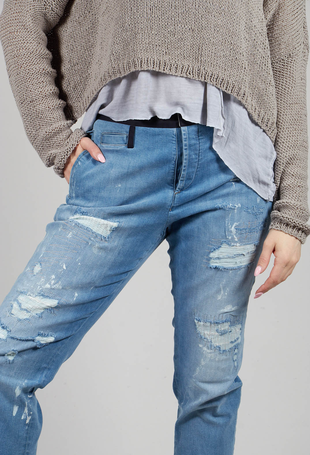Tapered Fit Jeans with Distressed Patch Detail in Mid Blue