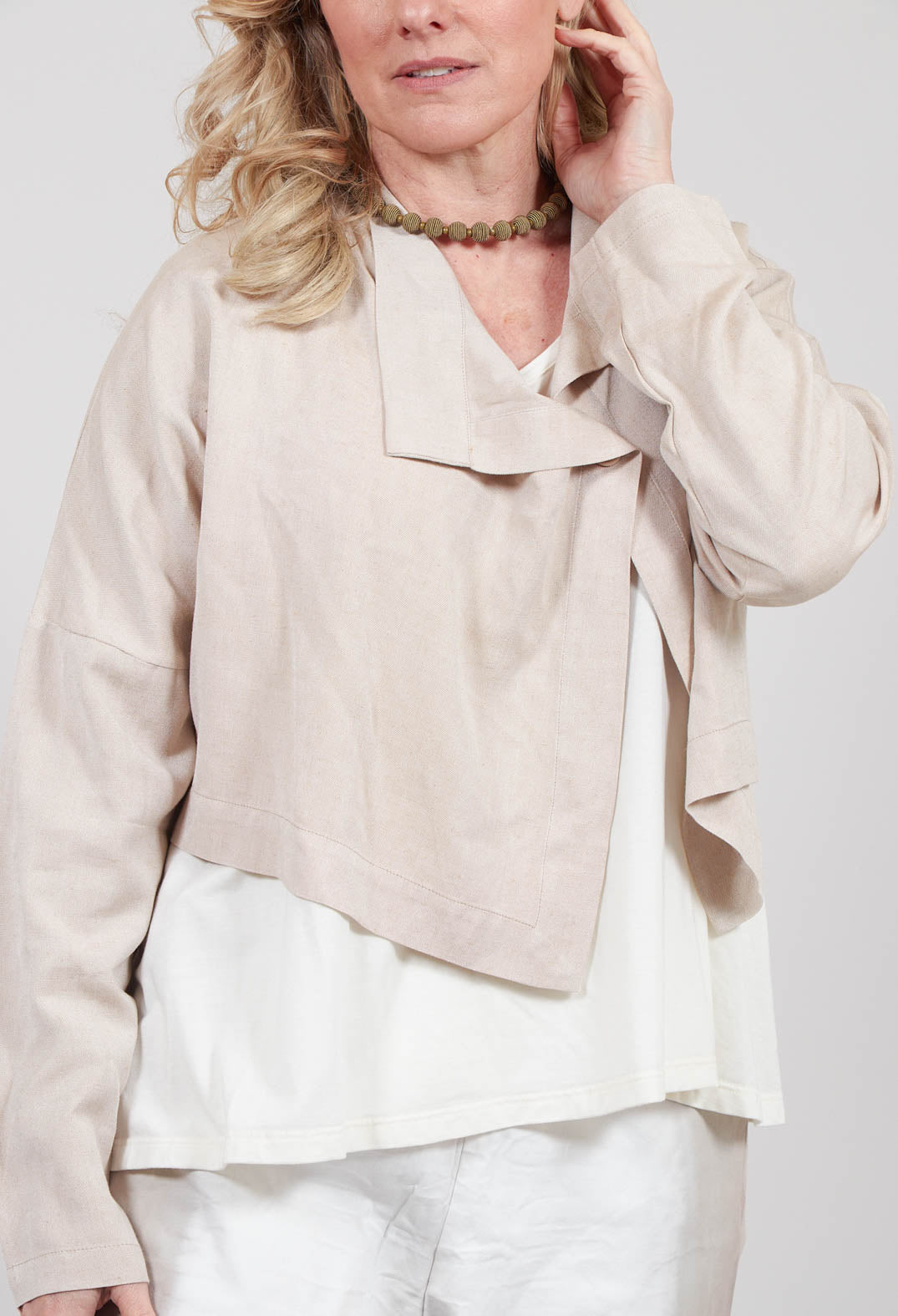 Cropped Cardigan with Pointed Collar in Beige