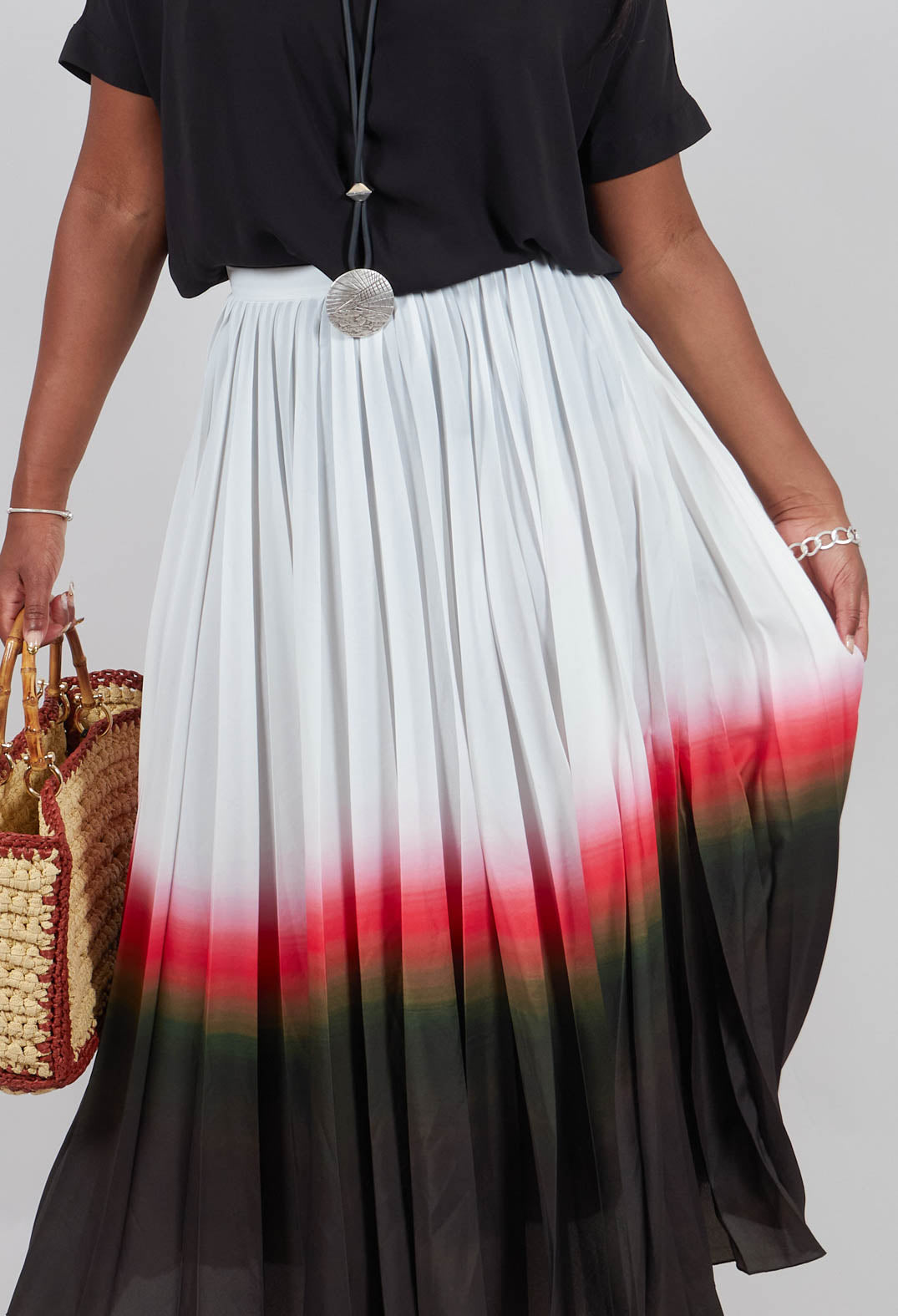 Pleated Skirt in White Faded Dye Hem line