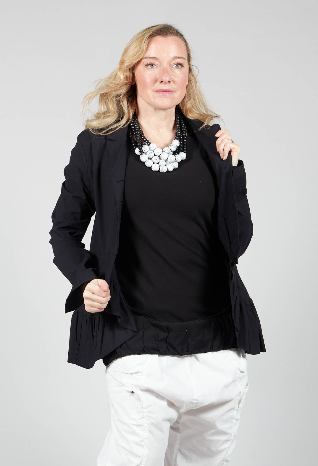 Tailored Jacket with Peplum Hem in Black