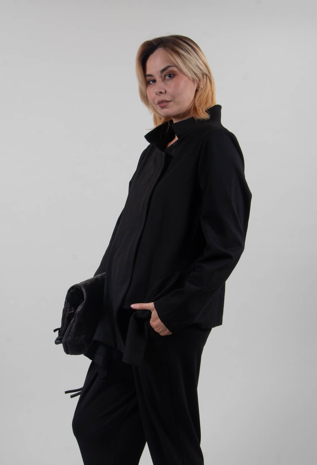 Long Sleeve Jacket with Asymmetric Peplum Hem in Black
