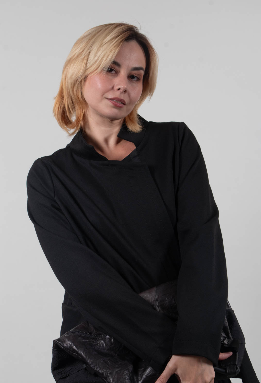 Long Sleeve Jacket with Asymmetric Peplum Hem in Black