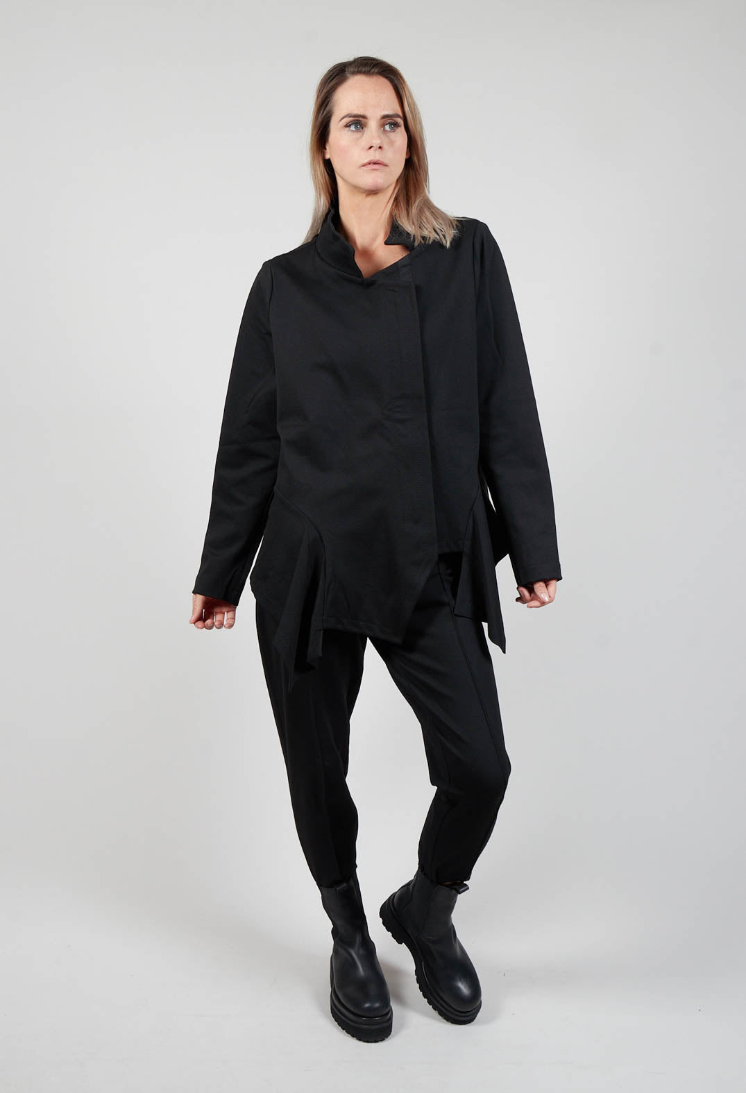 Long Sleeve Jacket with Asymmetric Peplum Hem in Black