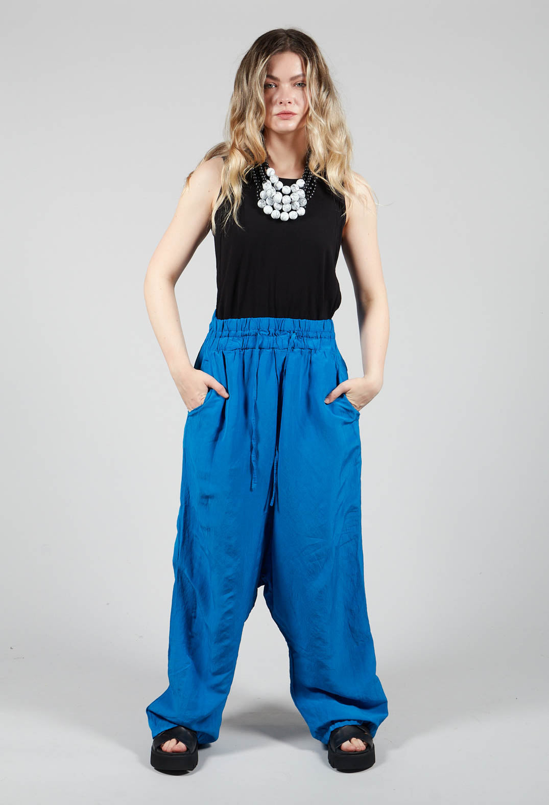 Cropped Linen Drop Crotch Trousers in Blue