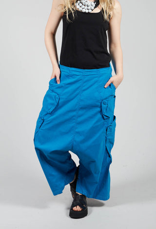 Drop Crotch Cropped Trousers With Side Pockets in Blue
