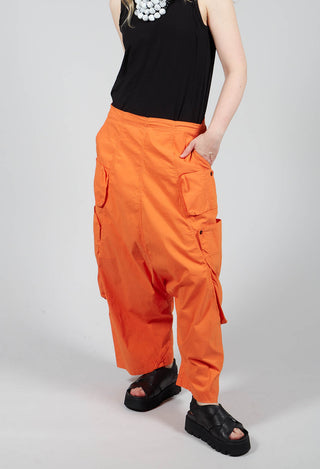 Drop Crotch Cropped Trousers With Side Pockets in Orange