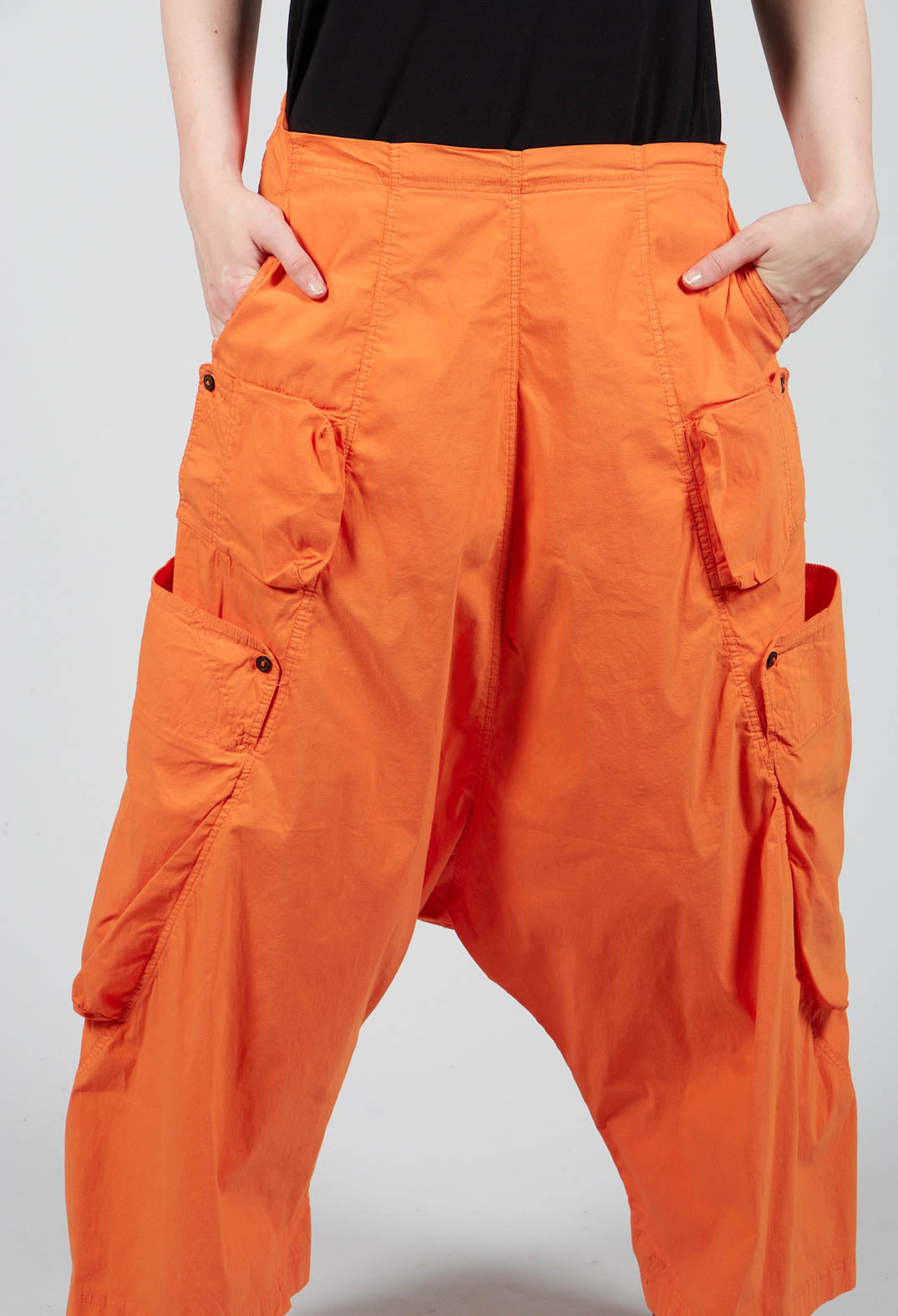 Drop Crotch Cropped Trousers With Side Pockets in Orange