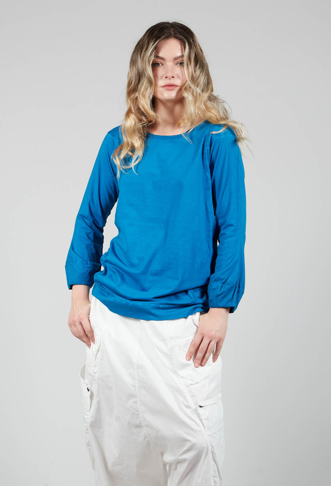 Round Neck Long Sleeved T Shirt with Bell Sleeves in Blue