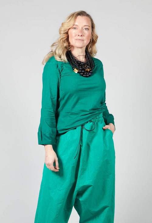 Round Neck Long Sleeved T Shirt with Bell Sleeves in Green