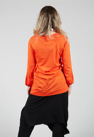 Round Neck Long Sleeved T Shirt with Bell Sleeves in Orange
