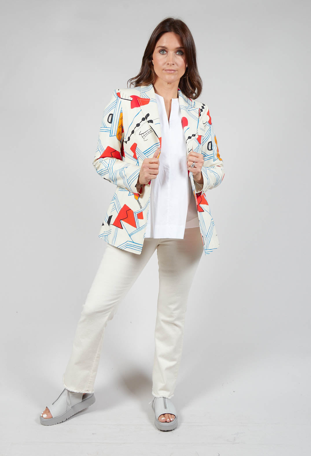 lady in a matisse print jacket with collar