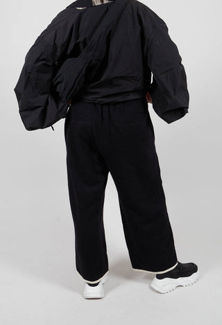 Pleated Trousers with Contrast Lining in Black