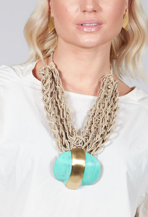 Oversized Necklace with Multiple Strings with Teal Pendant