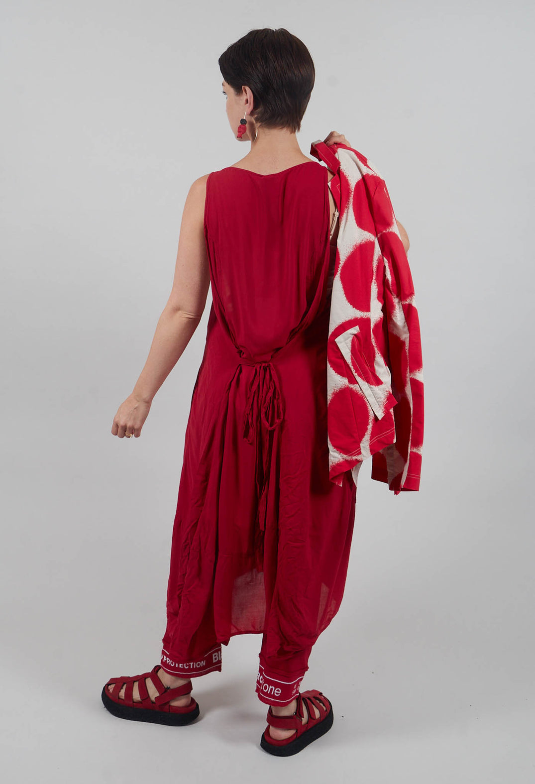 Sleeveless Jersey Dress with Asymmetric Hem in Chili