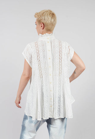 Kusfrau Top in Schnee