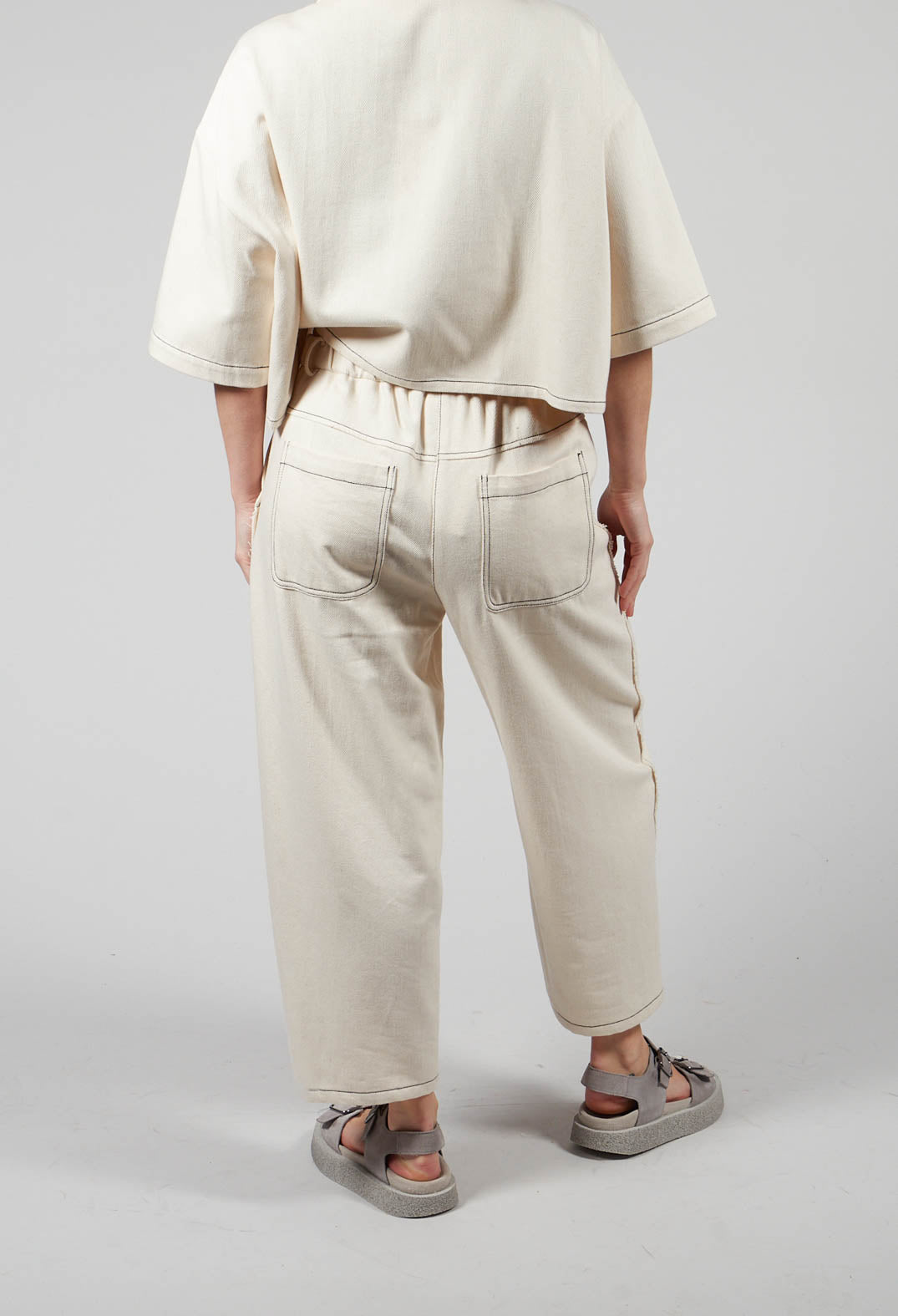 Raw Hemmed Jean Trousers in Off White