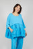 Top with Tulip Peplum Hem in Malibu