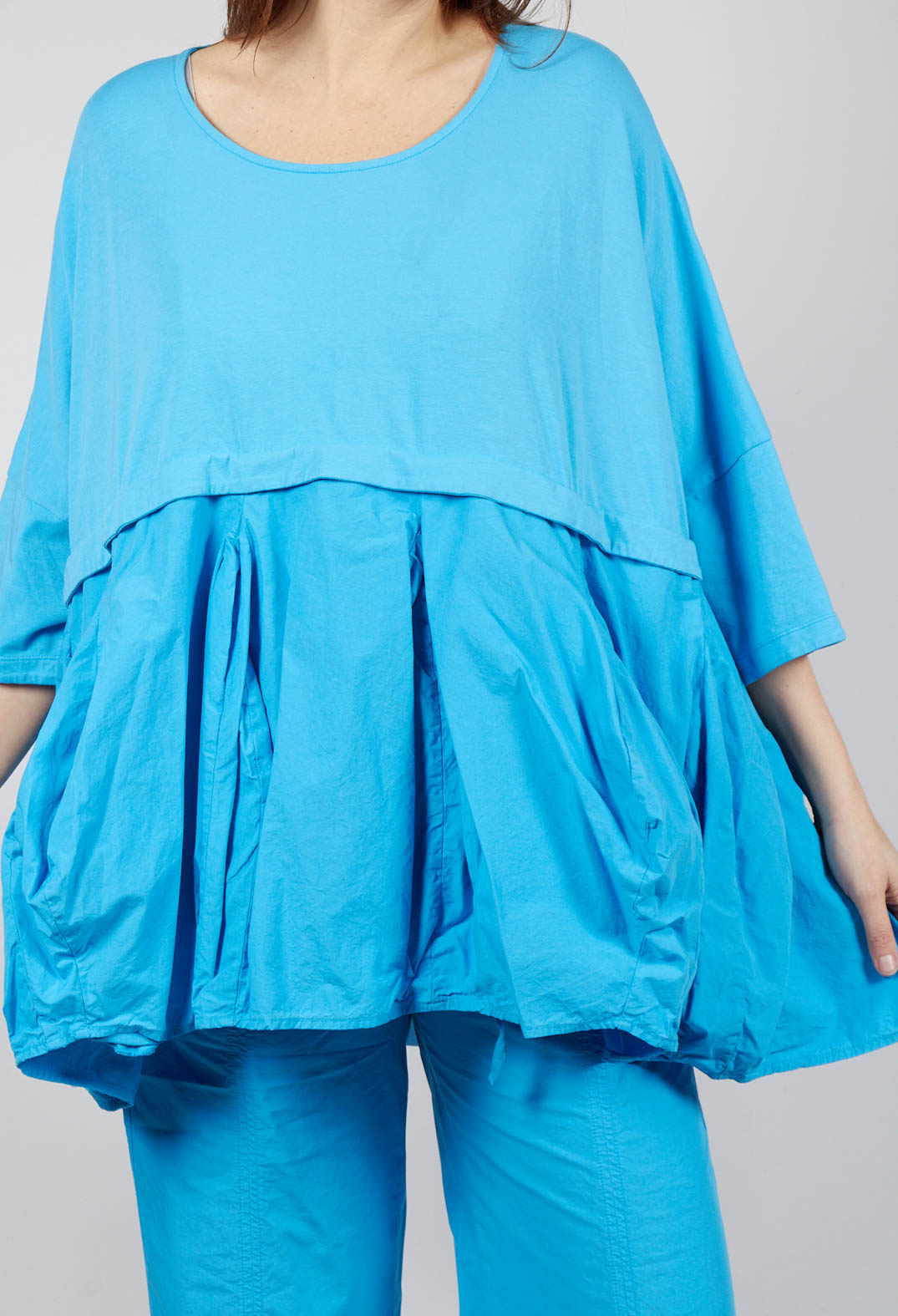 Top with Tulip Peplum Hem in Malibu