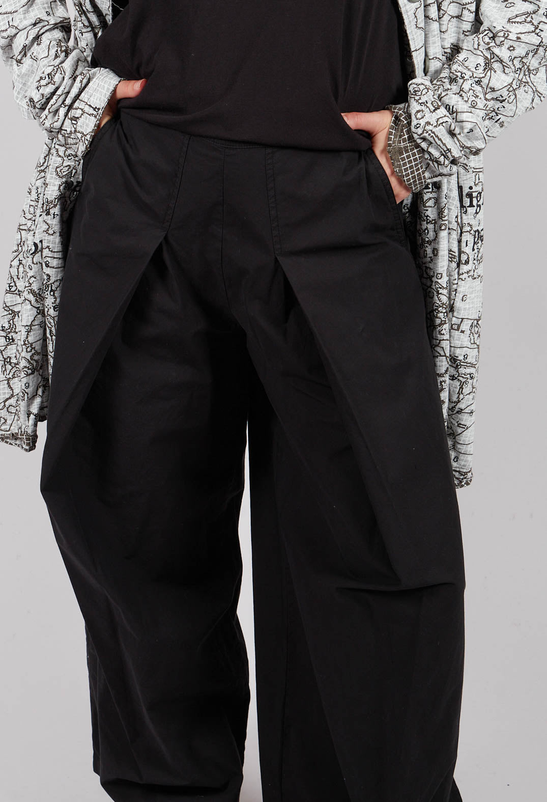 Trousers with Oversized Pleats in Black