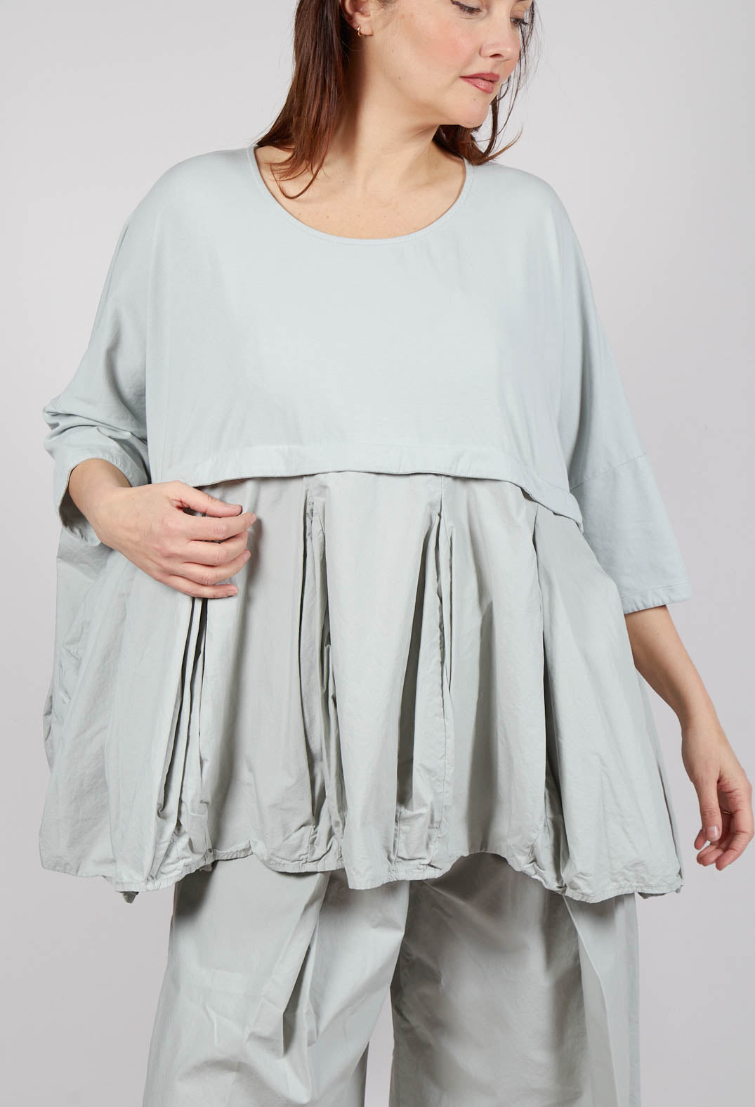Top with Tulip Peplum Hem in Grey