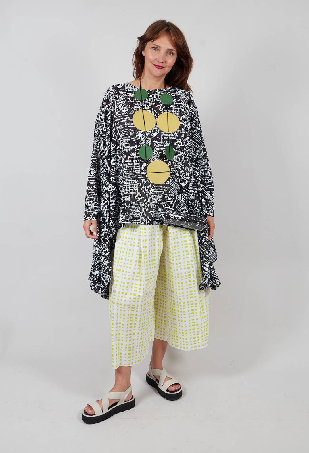 Cape Top with Bottle Embellishment in Black with White Seregraphy